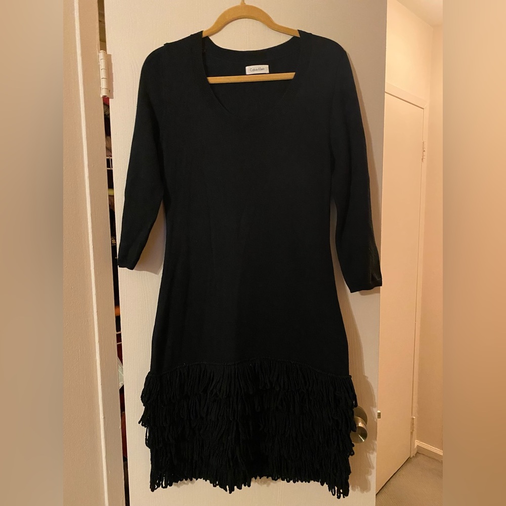 CALVIN KLEIN sweater dress with fringed bottom. Size M.